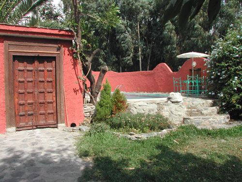 The entrance gate and pool