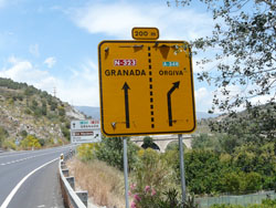Road sign at turn to Velez Benaudalla